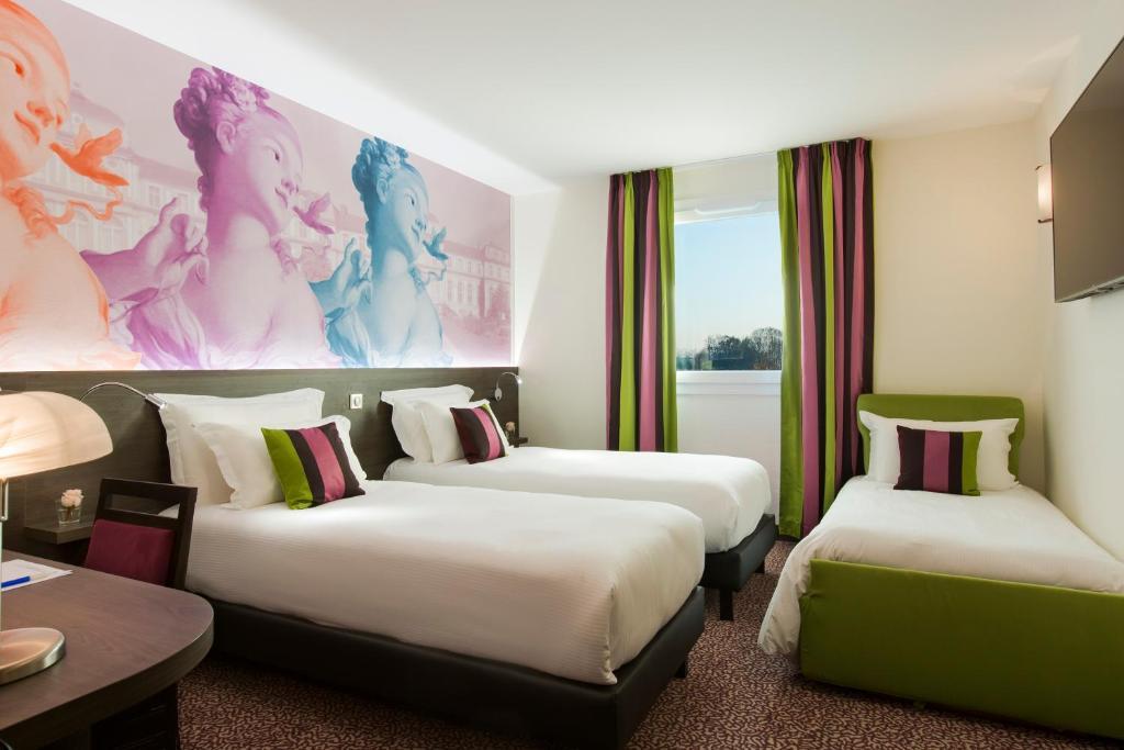 Hotel Roi Soleil Prestige Plaisir - St Quentin Buitenkant foto